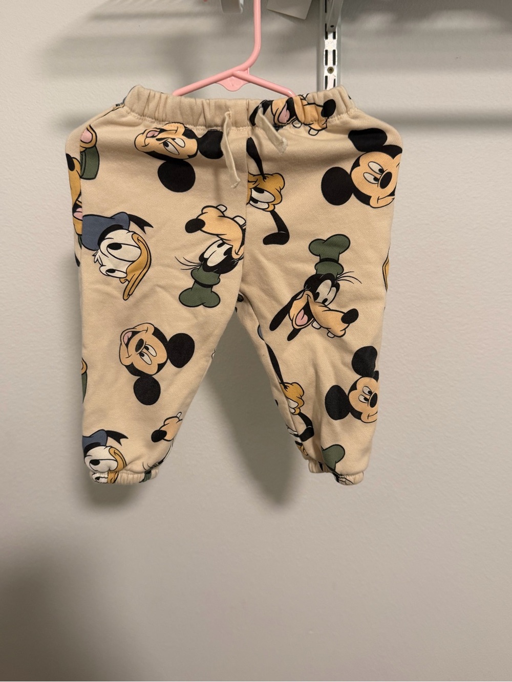 Disney Cream Jogger Pants with Black Character Accents